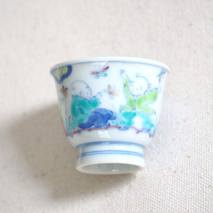 京焼 昭阿弥作 淡彩唐子煎茶杯 手描き唐子文様 伝統工芸 京都陶器　側面から見ている