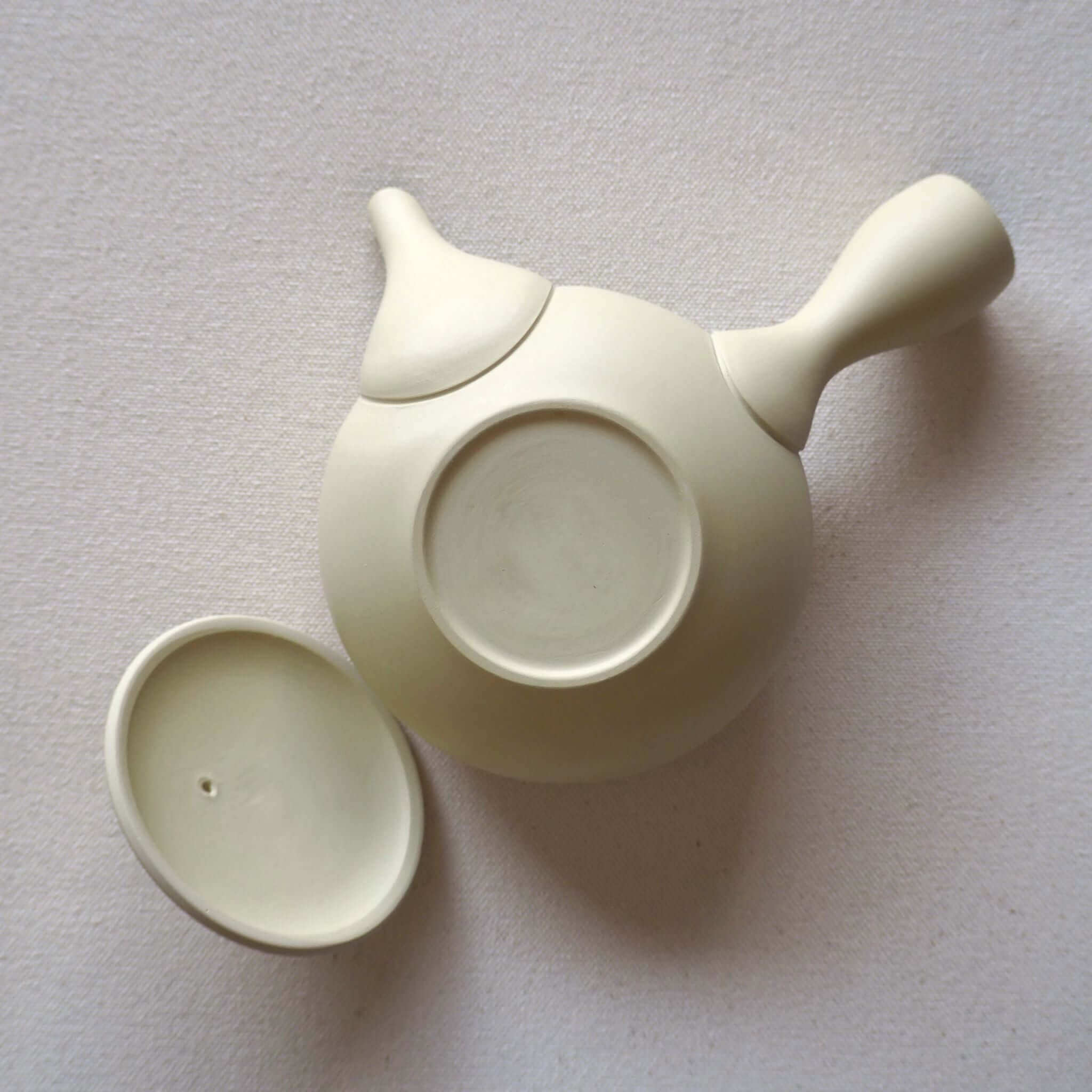 Tokonameware flat round white teapot